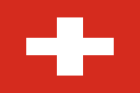 The flag of Switzerland, featuring a white Greek cross centered on a square red background.
