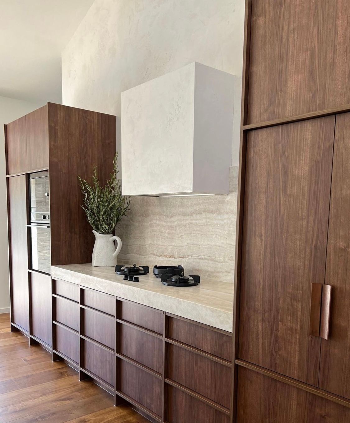 A Kitchen With Wooden Cabinets and a Stove Top Oven — Hot Rock Granite In Brisbane, QLD