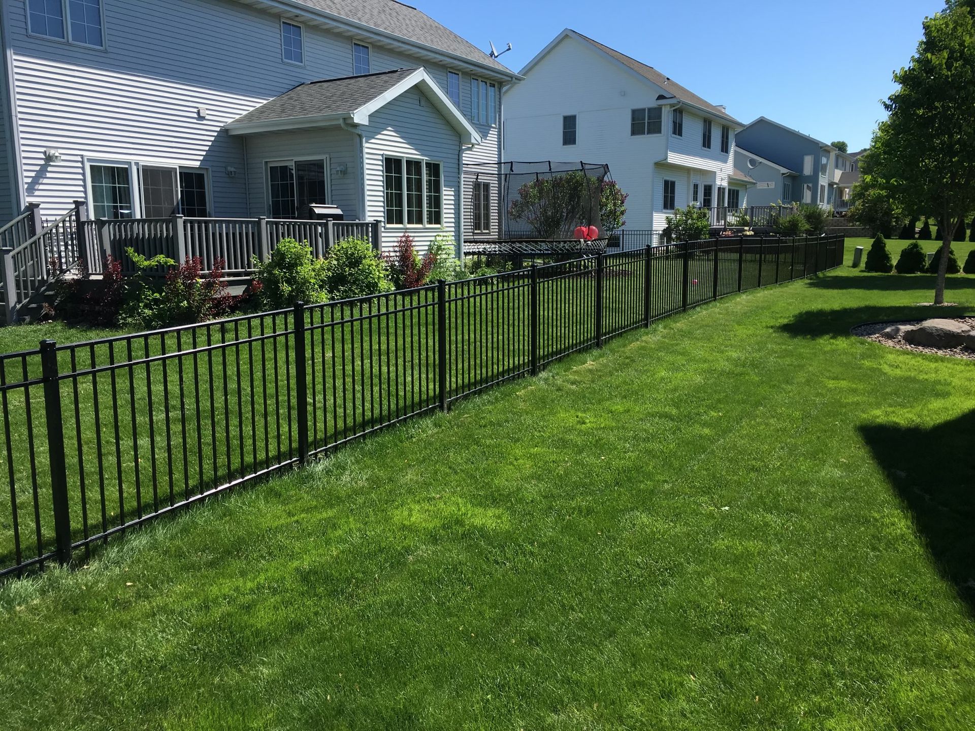 Black aluminum fence installation in Madison, WI