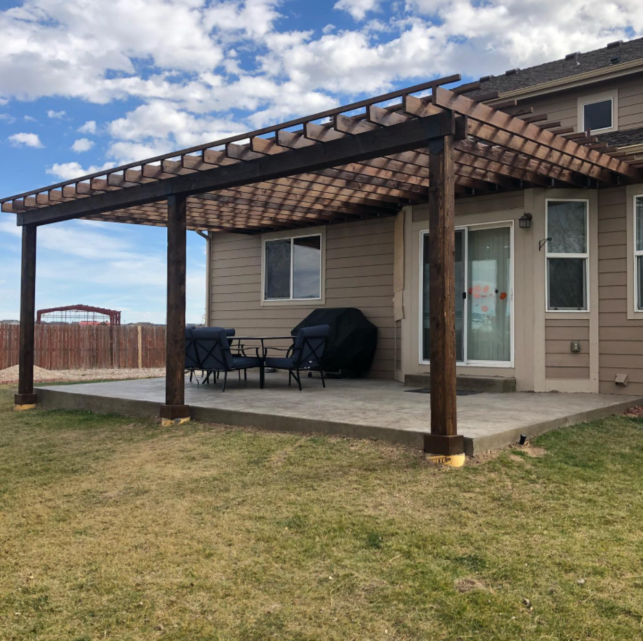 Young Couple Having Breakfast In Their Kitchen — Cheyenne, WY — All Decked Out LLC