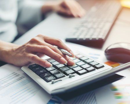 Accountant Making Calculations — Olympia, WA — Bliss & Tuttle, CPAs