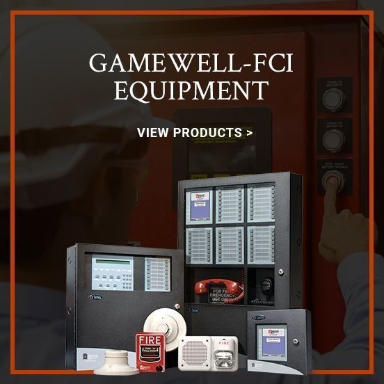 Gamewell-FCI equipment ad with fire alarm panels and devices on a dark background, “View Products” text