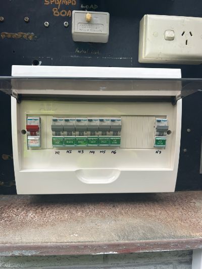 White Electrical Circuit Breaker Box With Toggle Switches — Fry Electrical In Central Coast, NSW
