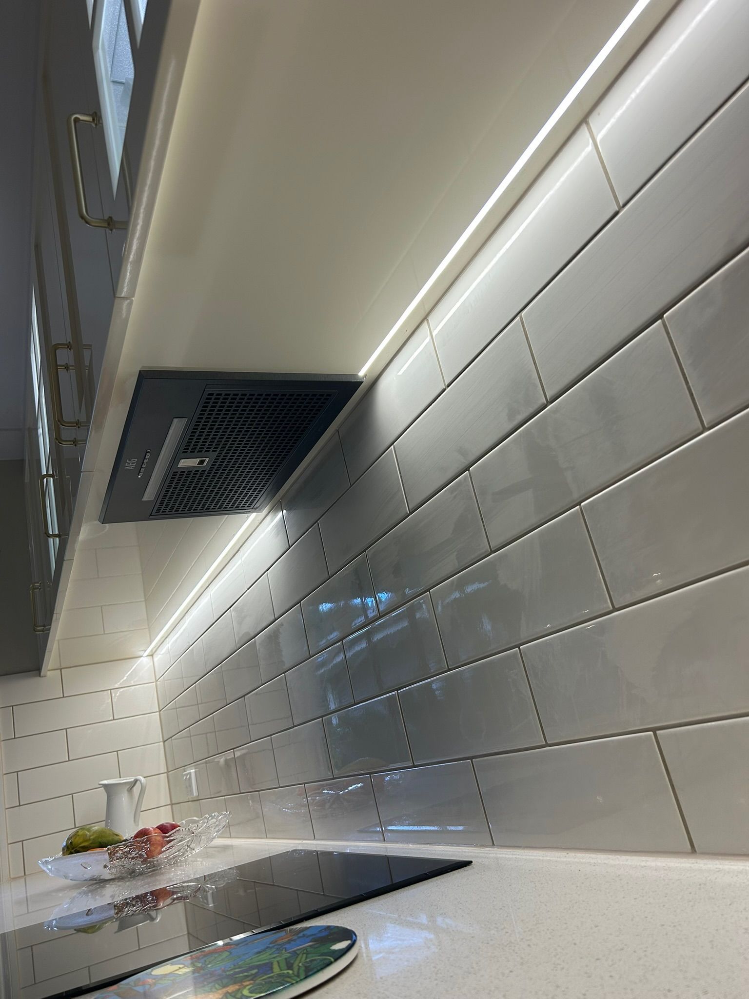 Hands Using Screwdriver On Track Lighting Fixture — Fry Electrical In Budgewoi, NSW