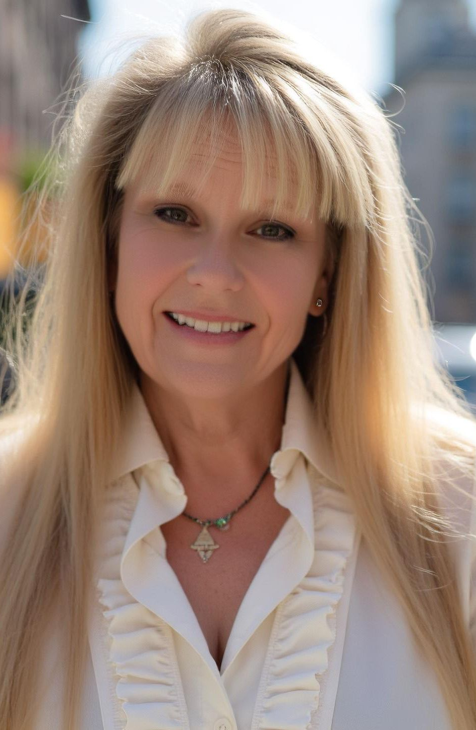 A dedicated professional who won't let you down. A profile pic of Laura Luther, Realtor in downtown West Chester, PA.