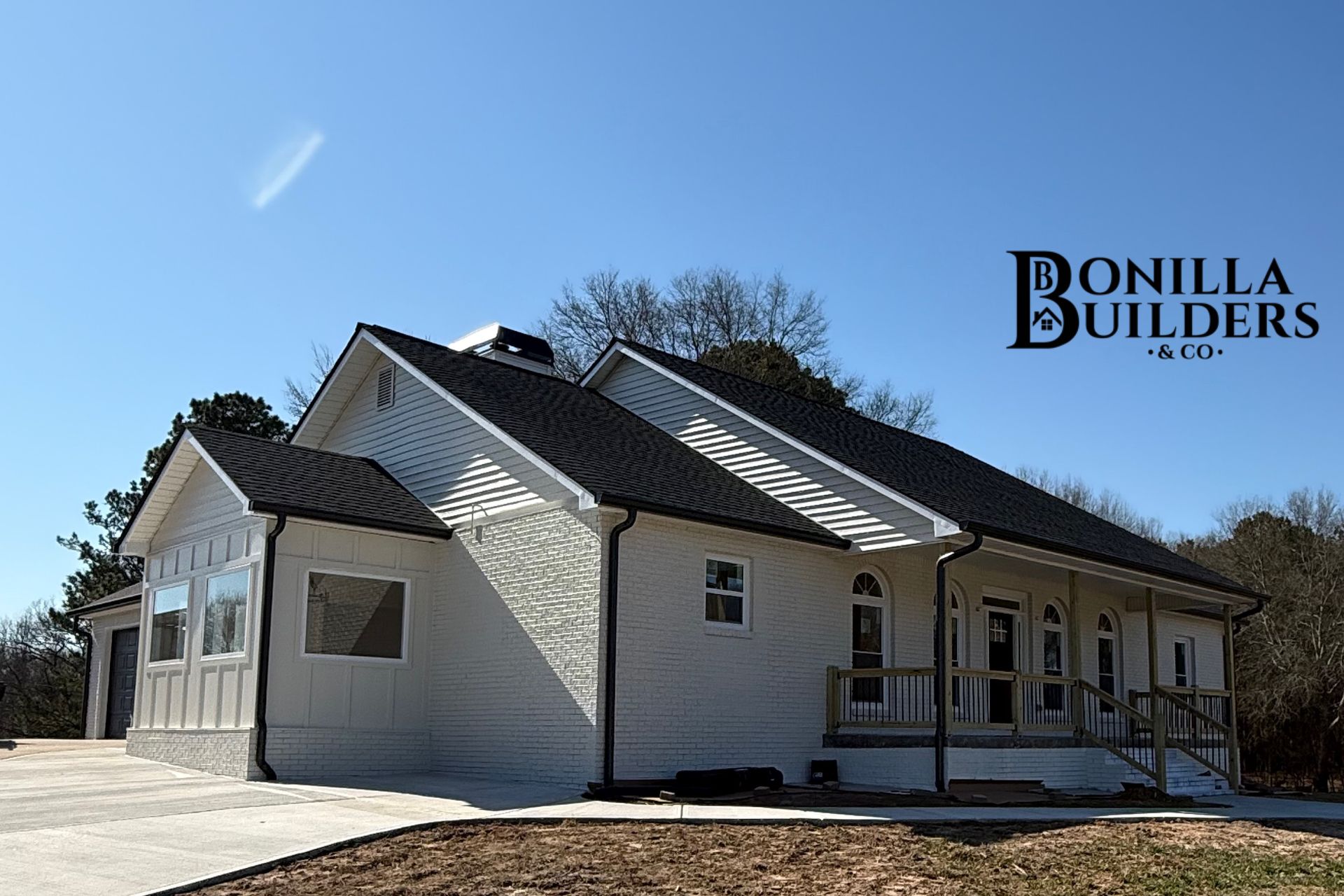 Exterior renovation, including an exterior addition, new drive way, new patio