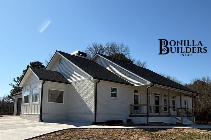 Exterior renovation, including an exterior addition, new drive way, new patio