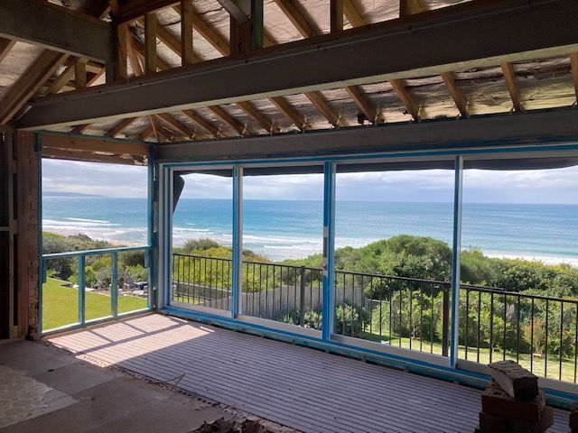 A house under construction with a view of the ocean. — Brad Griffiths Building In Culburra Beach, NSW