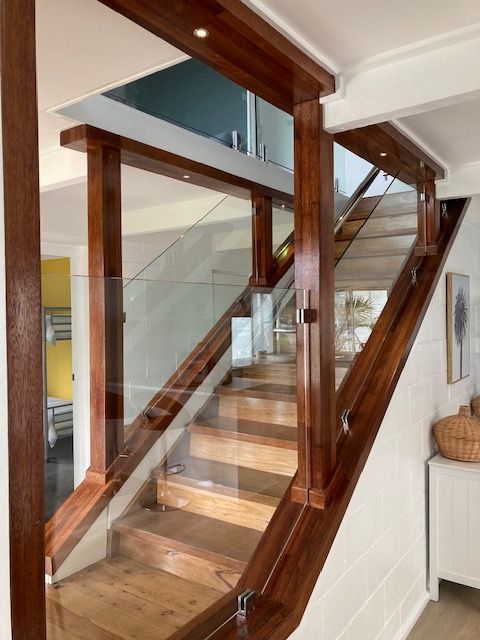 A Modern House With A Large Driveway And A Large Garage — Brad Griffiths Building In Culburra Beach, NSW