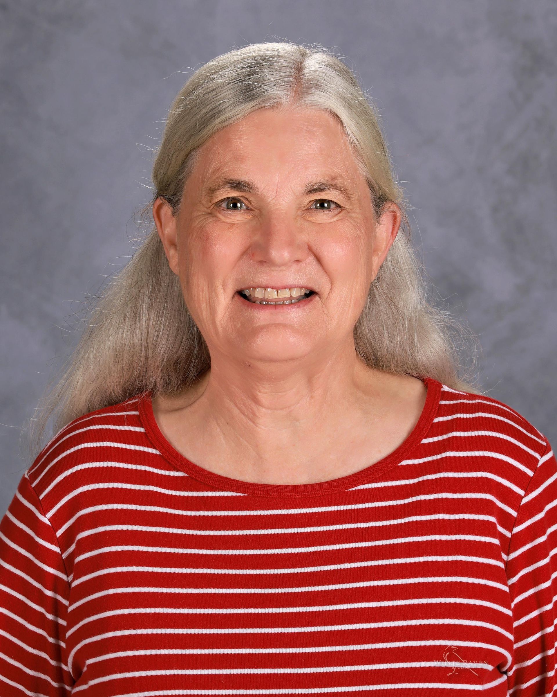 Woman in flowery shirt s a