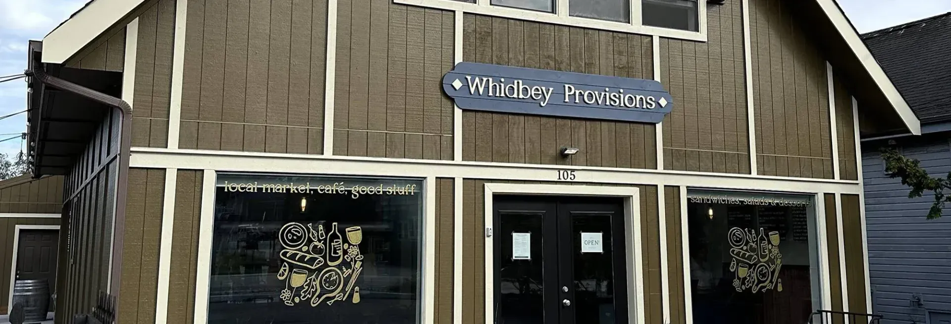 A brown, half-timbered storefront with a sign reading 