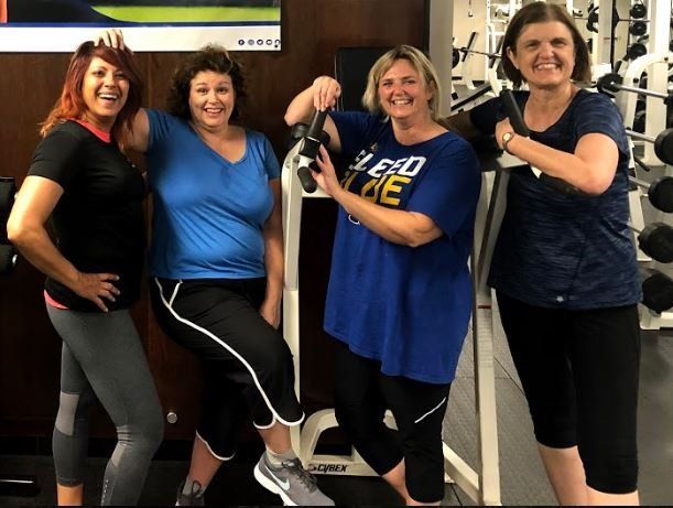 ladies working out together