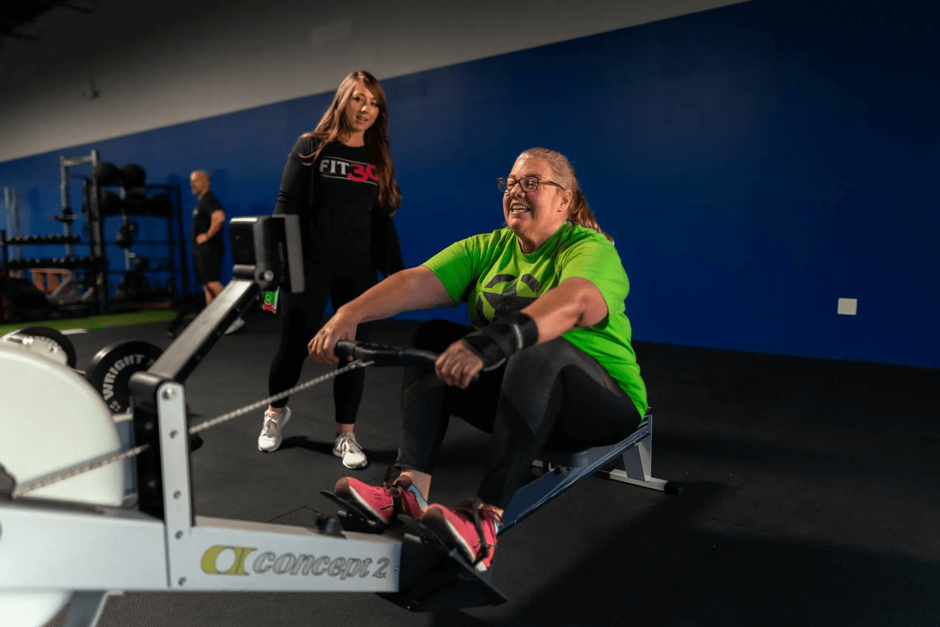 woman doing  workout on rowing machine