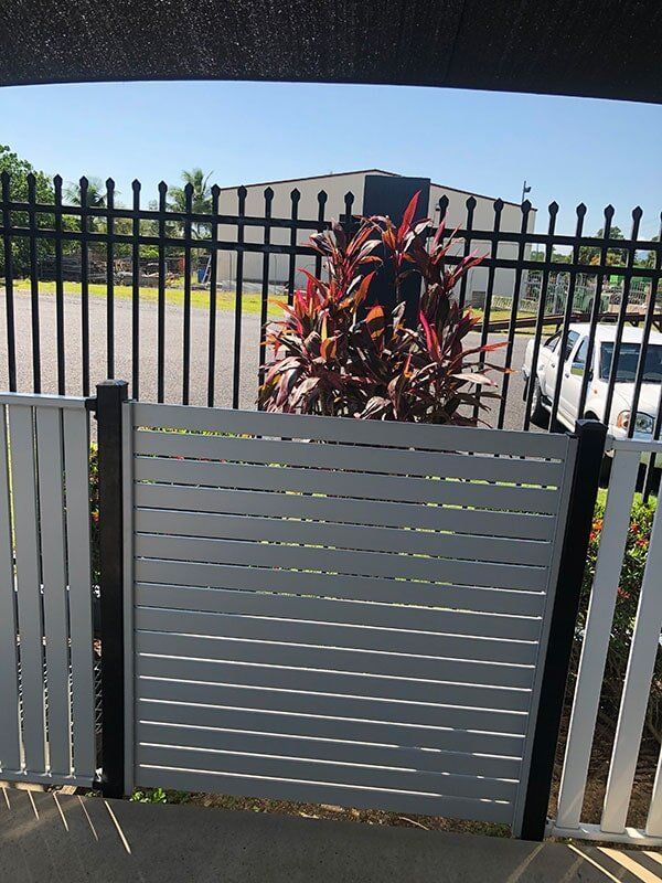 white lattice style gate - gate automation Cairns, QLD