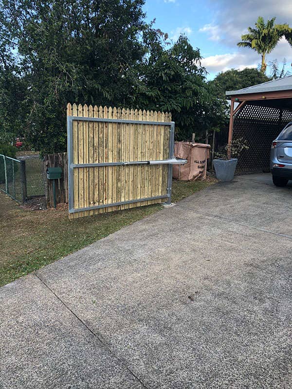 wooden fence automatic gate - gate automation Cairns, QLD