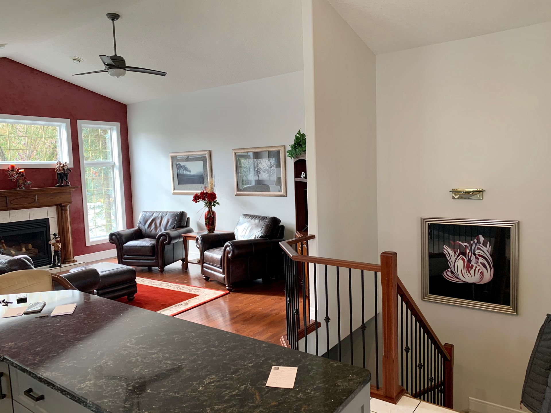 A living room filled with furniture and a fireplace.
