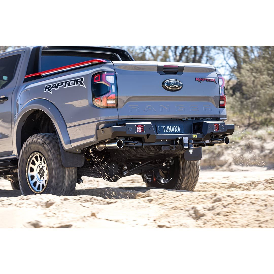 Grey Ford Raptor Truck on a Sandy Beach — TJM Wagga Wagga In Ashmont, NSW 