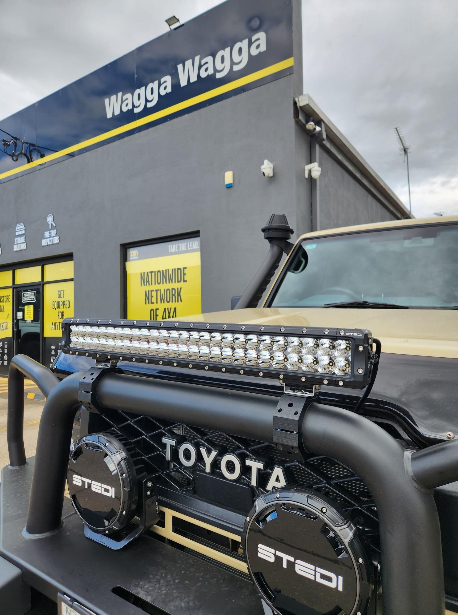Black and Tan Toyota Truck With Lights and Bull Bar — TJM Wagga Wagga In Ashmont, NSW