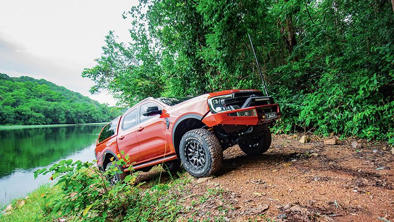 Red 4x4 Car With Lake Background — 4WD Accessories In Ashmont, NSW