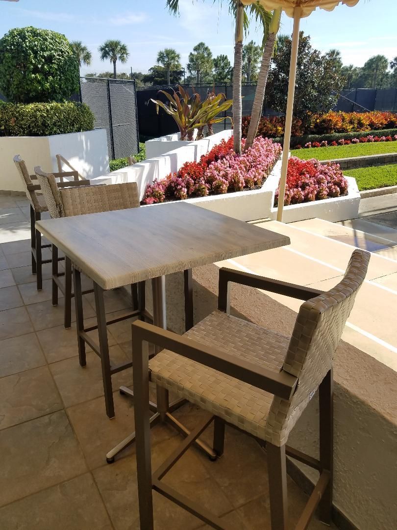 Outdoor photo of table and chairs at Gleneagles Country Club