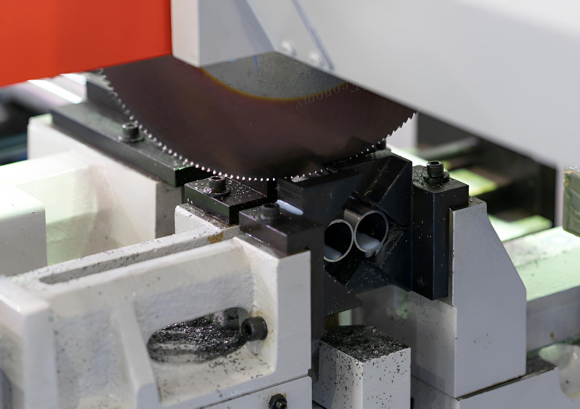 A Machine Is Cutting A Piece Of Metal With A Circular Saw — Wallers Precision Tooling In Paget, QLD