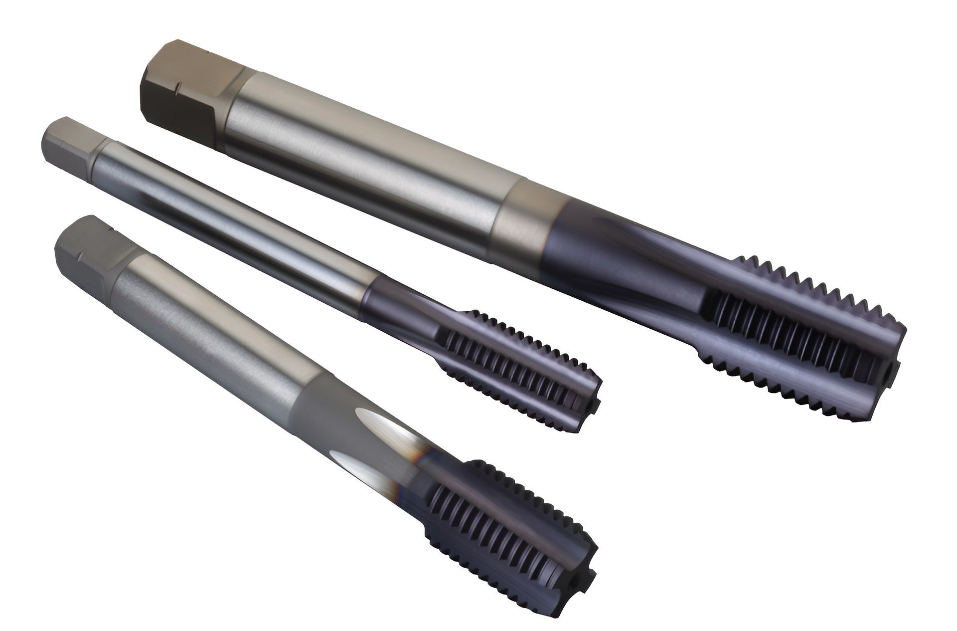 Three Different Sizes Of Taps On A White Background — Wallers Precision Tooling In Paget, QLD