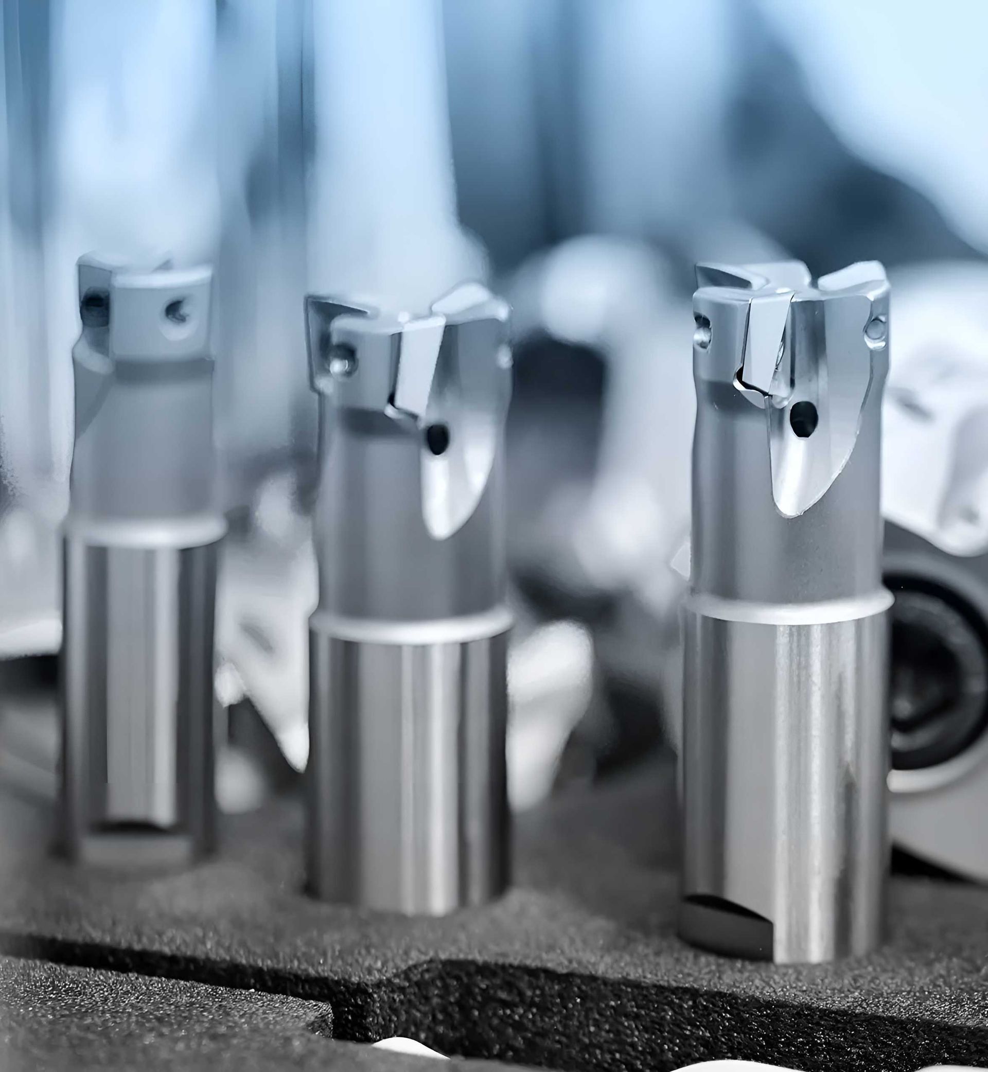 A Group Of Metal Cylinders Are Sitting On Top Of A Table — Wallers Precision Tooling In Paget , QLD