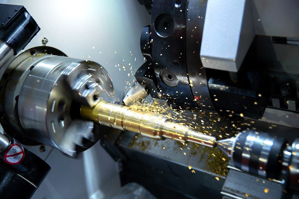 A Machine Is Cutting A Piece Of Metal On A Lathe — Wallers Precision Tooling In Mackay, QLD