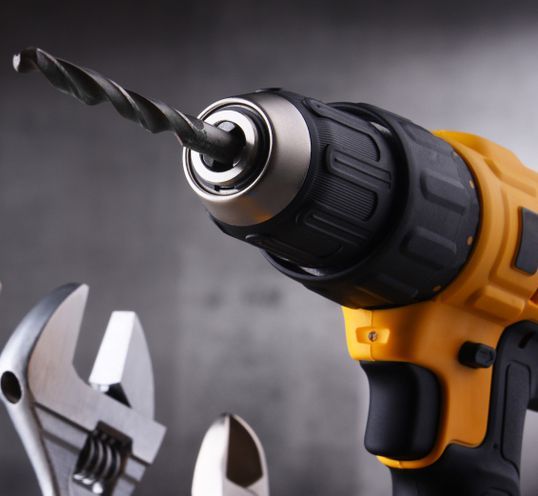 A Close Up Of A Drill With A Drill Bit In It — Wallers Precision Tooling In Proserpine, QLD