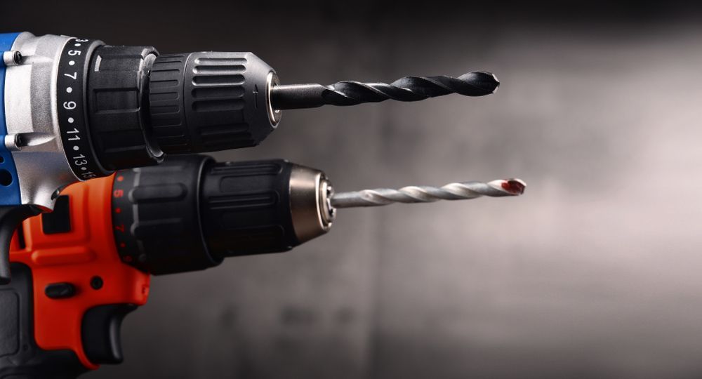 Two Drills Are Sitting Next To Each Other On A Table — Wallers Precision Tooling In Rockhampton, QLD