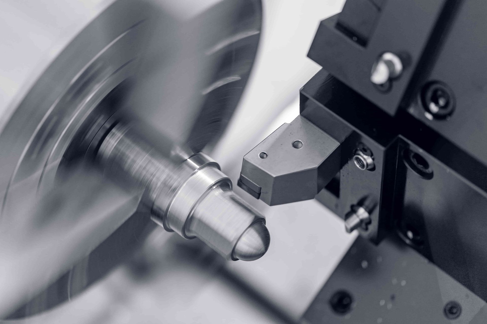 A Machine Is Cutting A Piece Of Metal On A Table — Wallers Precision Tooling In Rockhampton, QLD