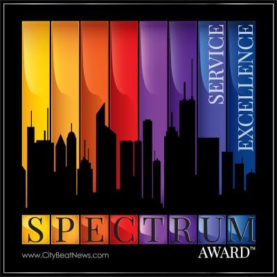 A spectrum award logo with a city skyline in the background