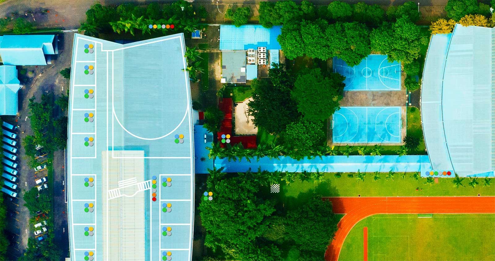 an aerial view of the german school jakarta with trash collection points