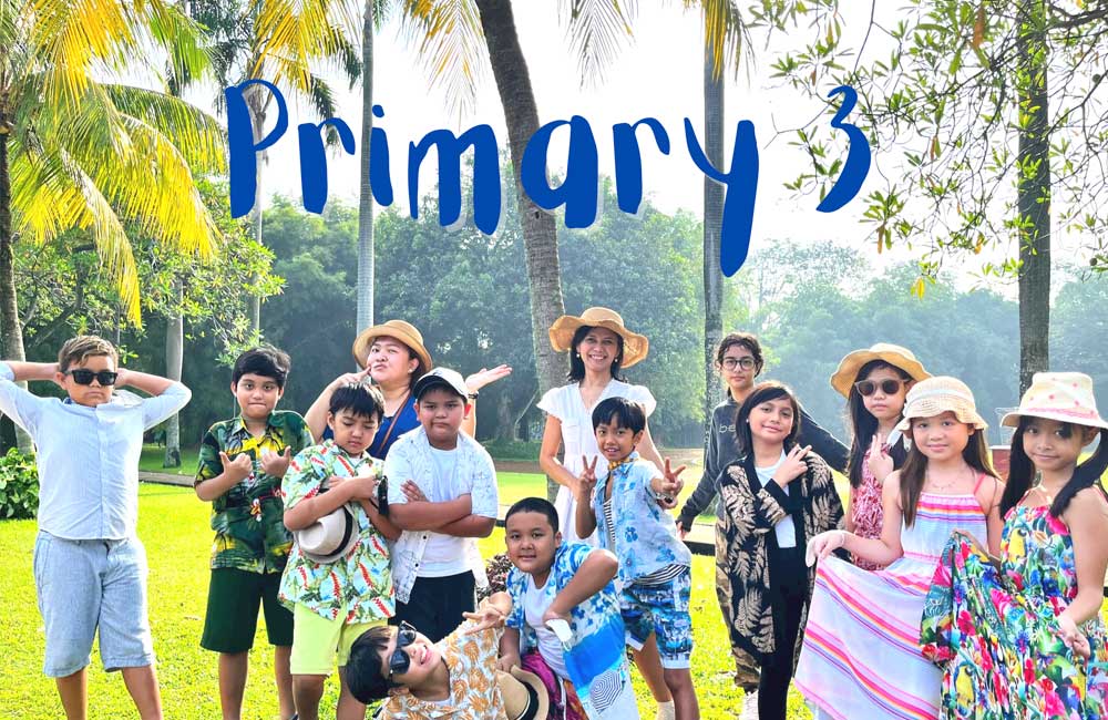 A group of children are posing for a picture in a park.