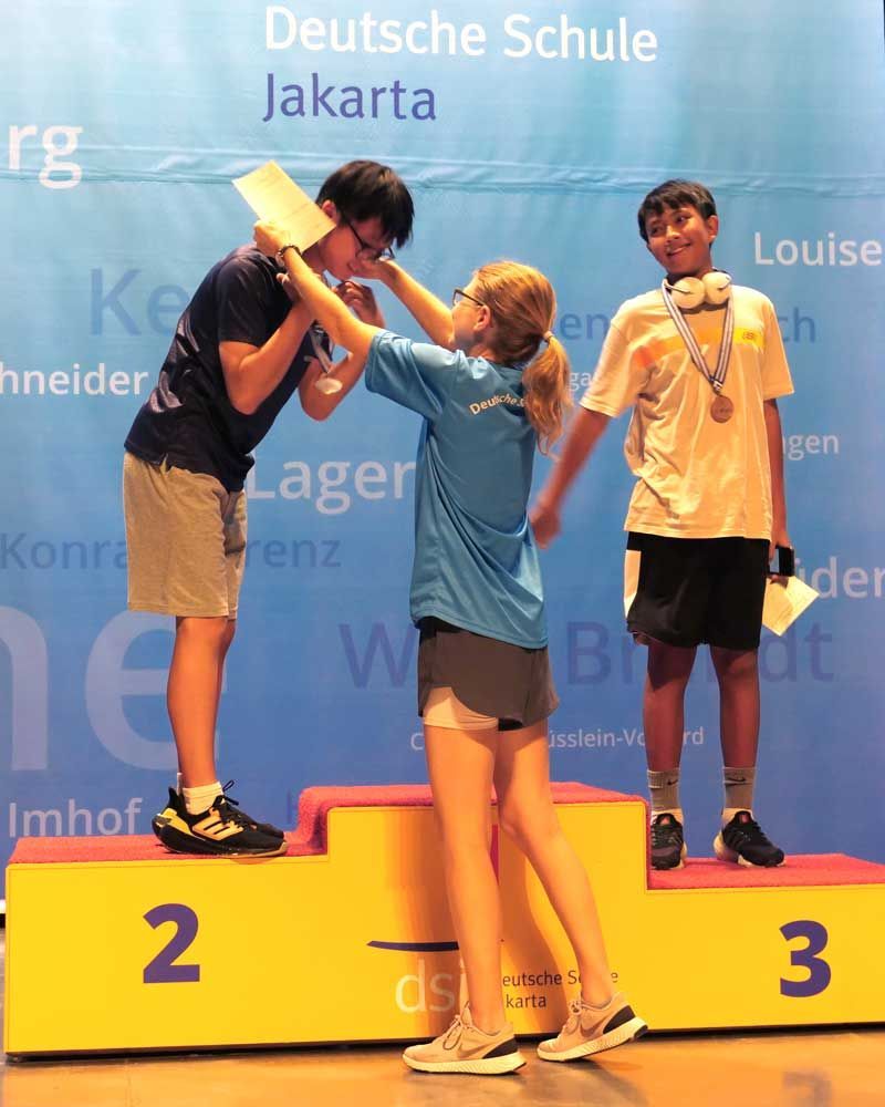 A podium with the number 2 and 3 on it