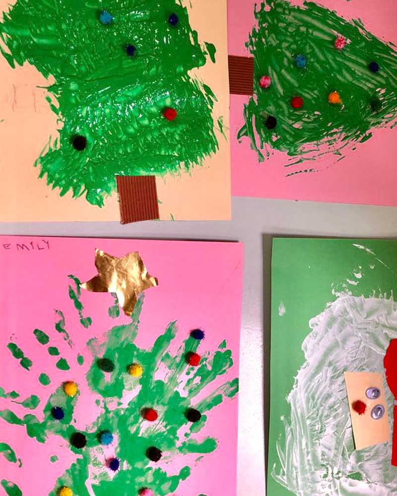 A painting of a christmas tree made by a child