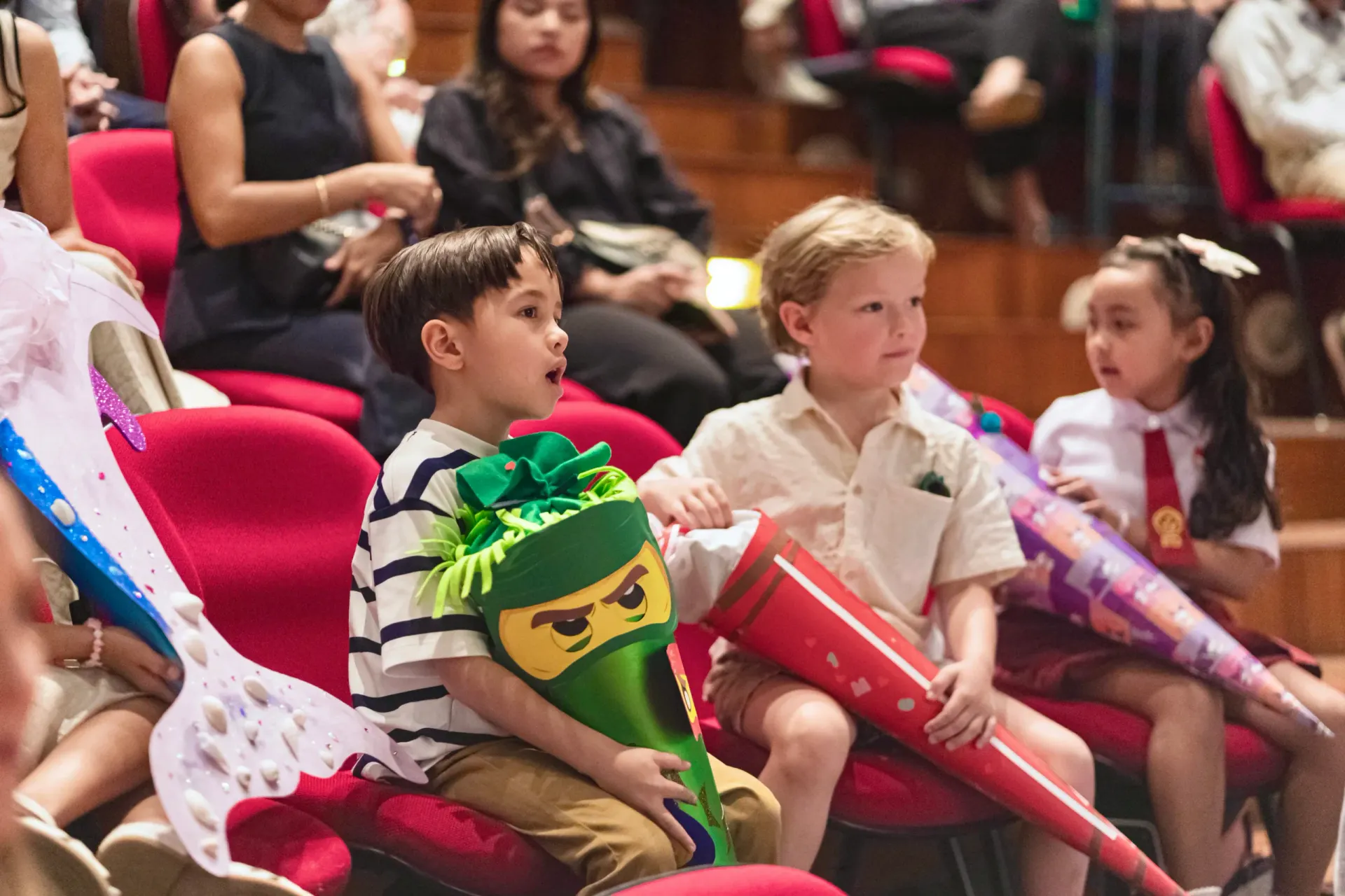 1st graders with their Schultüten in the DSJ Auditorium