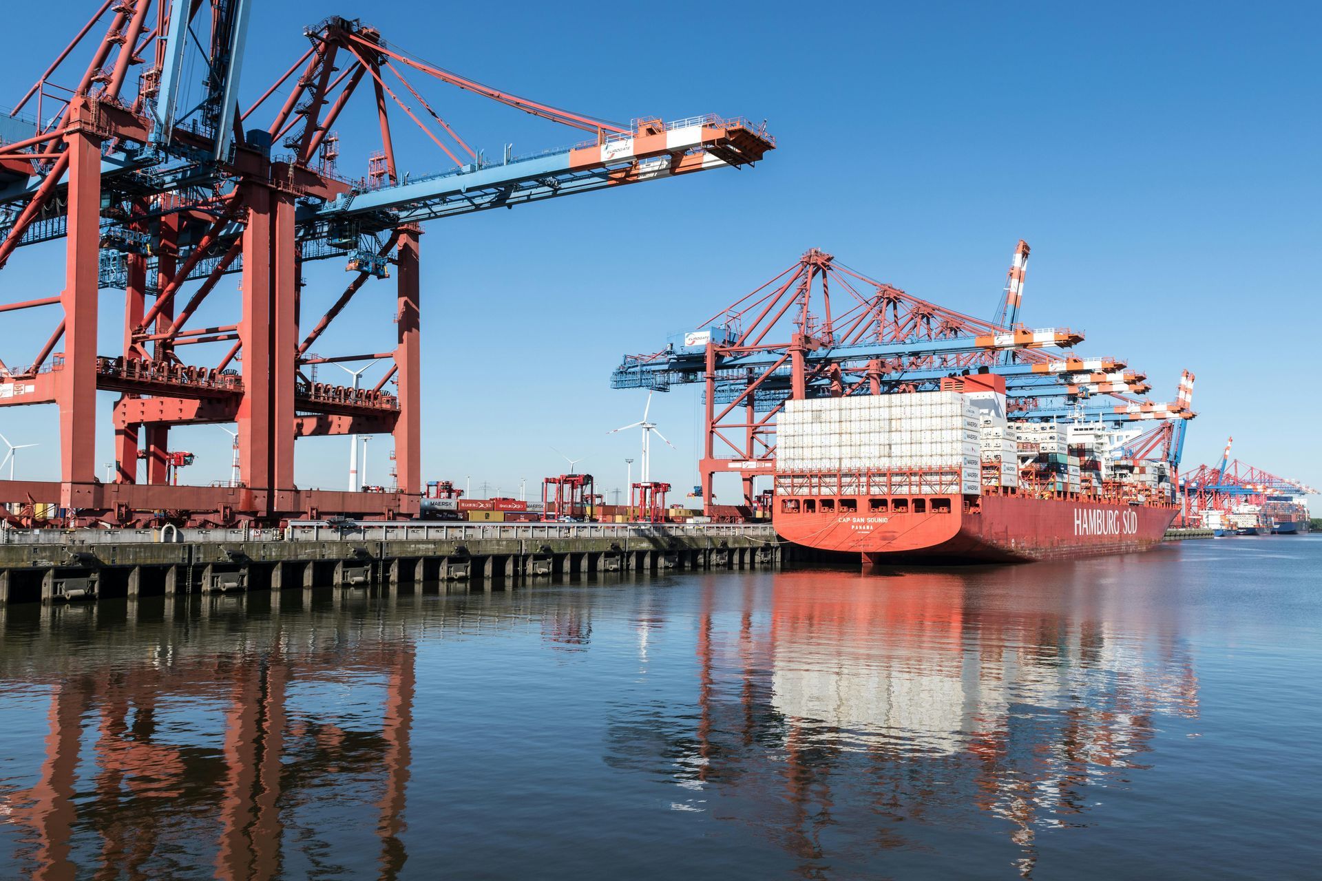 Harbor with container ship and cranes