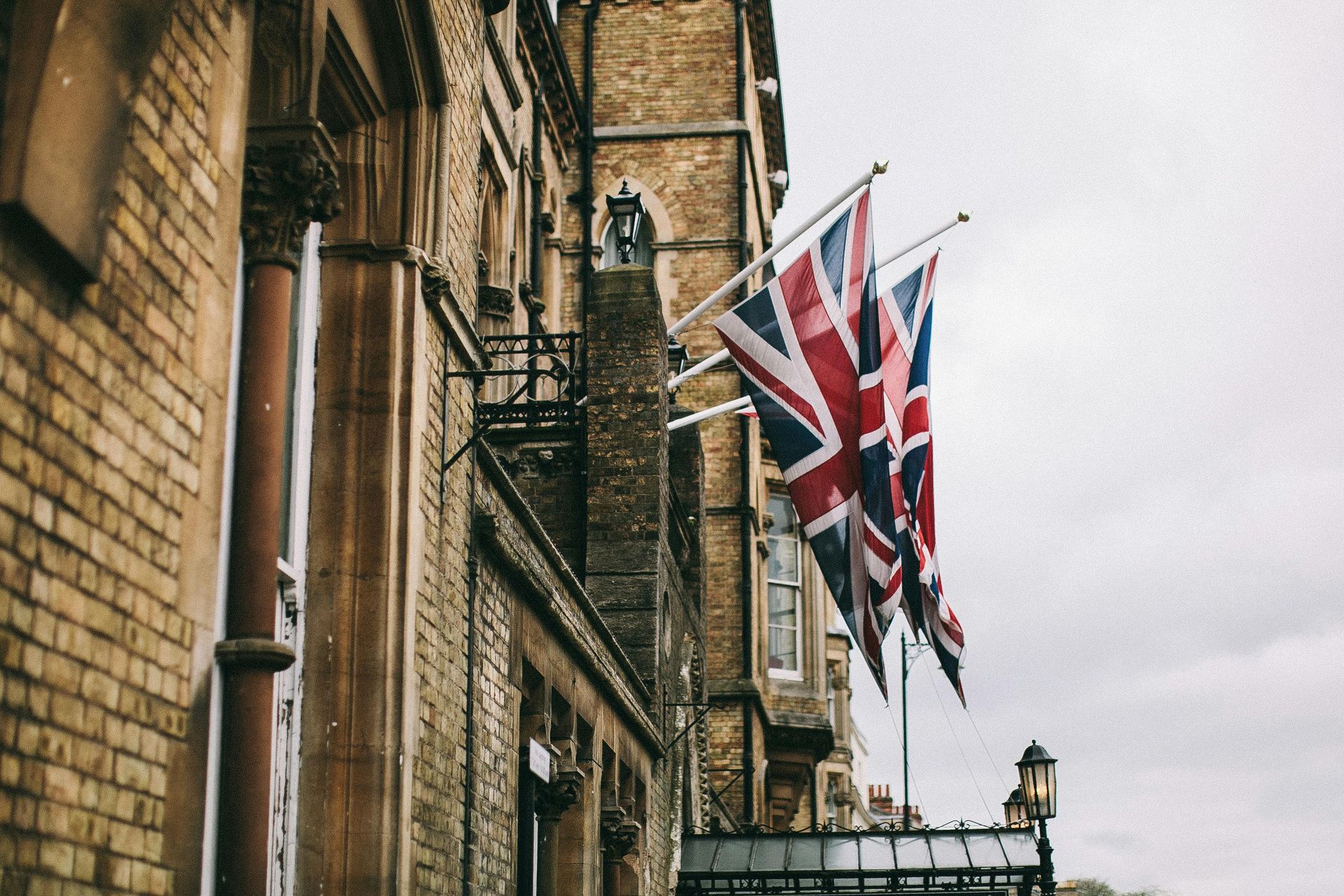 Old building with two British Union Jack flags