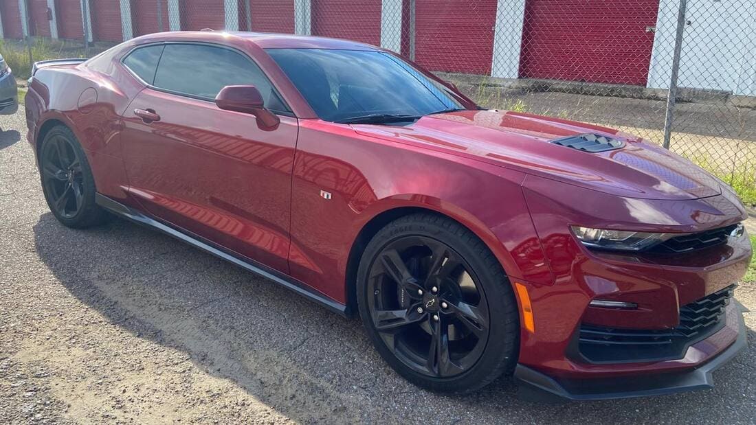 red car with tinted windows