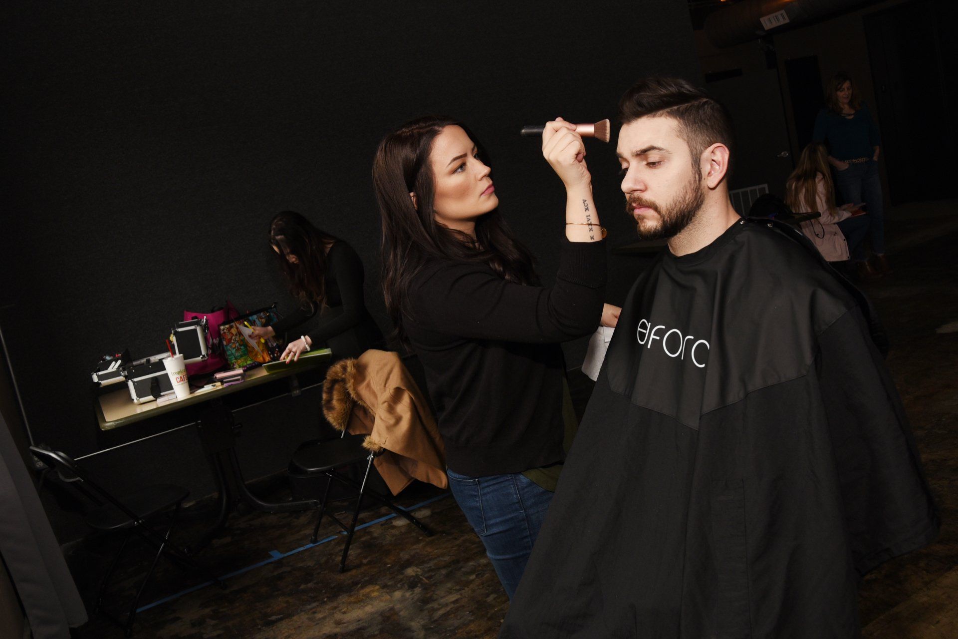 Behind-the-scenes makeup on set with RISE Beauty Co.