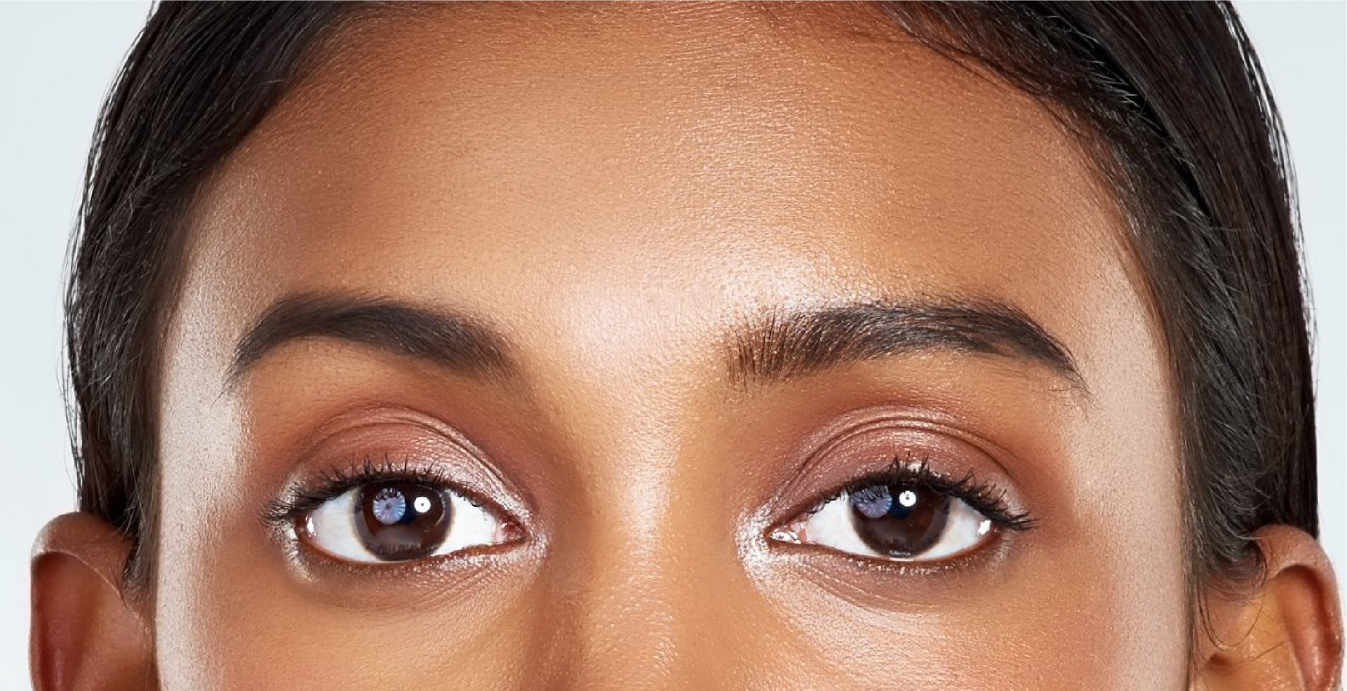 A close up of a woman 's face.