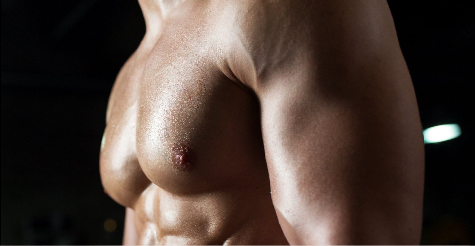 A close up of a man 's chest and arms.