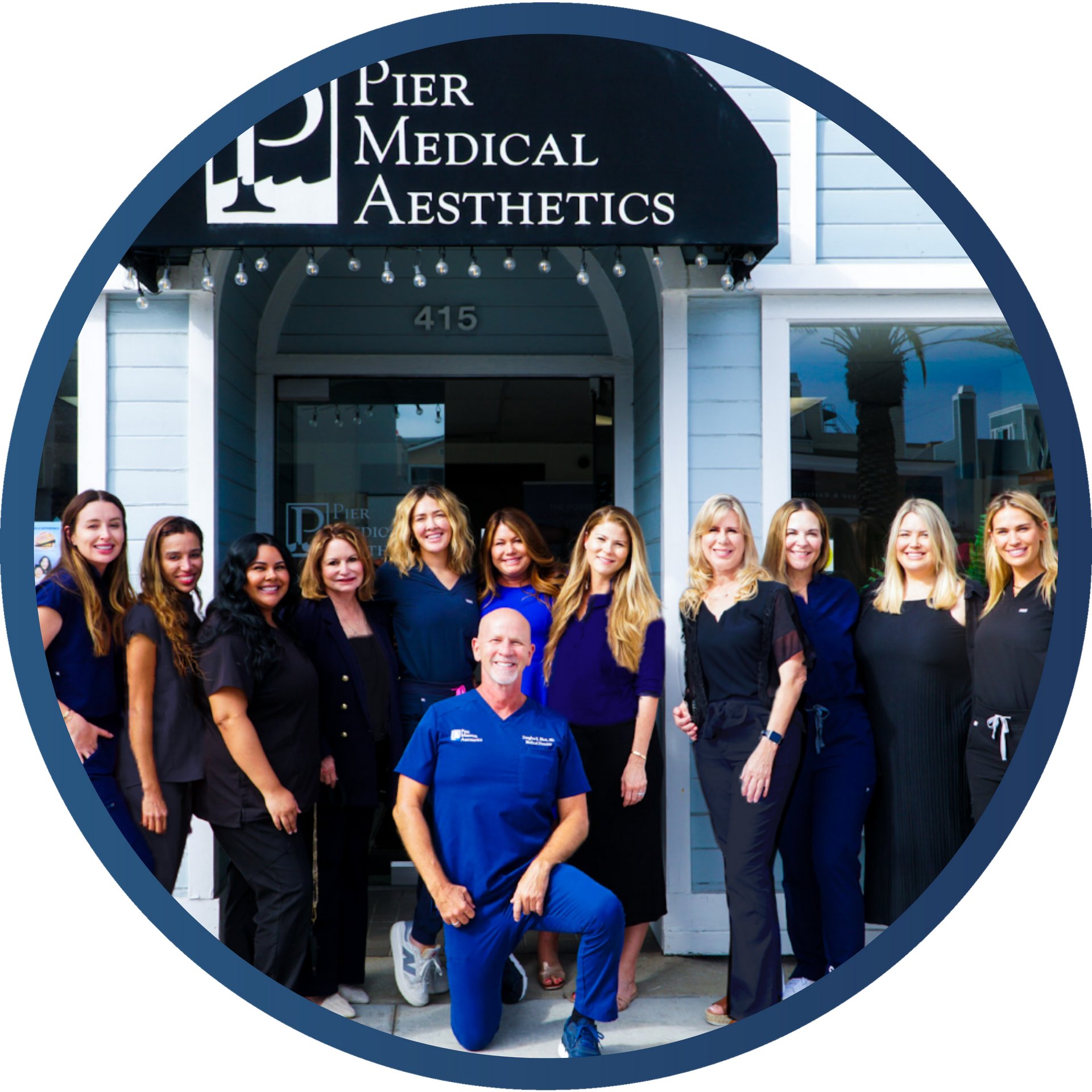 The providers posing for a picture in front of pier medical aesthetics
