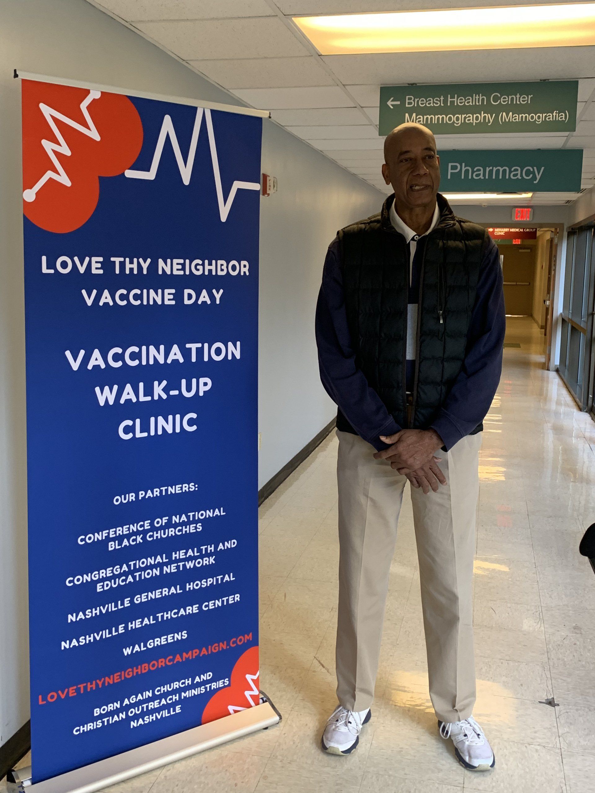 Man Beside the Vaccination Banner — Nashville, TN — CHEN