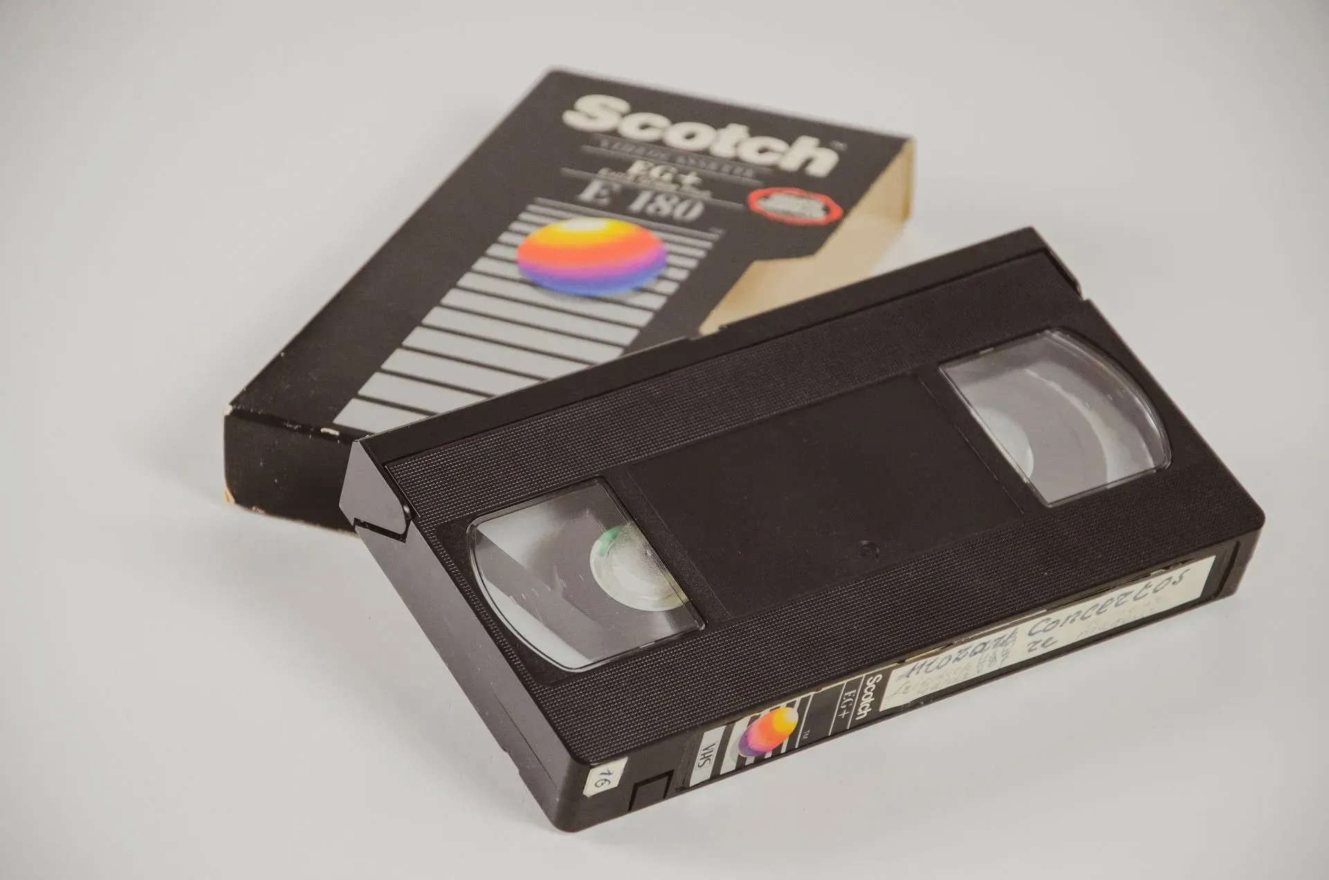 Black VHS tape and box labeled 