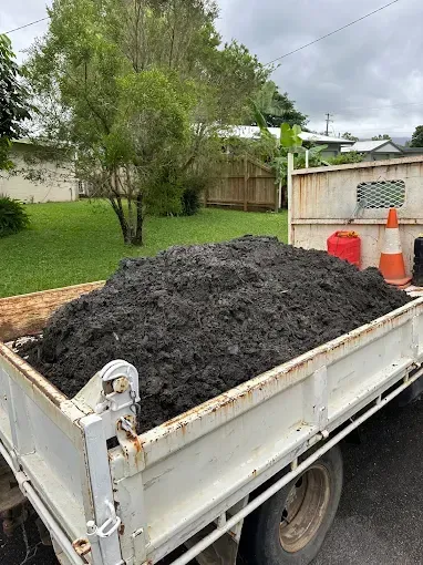 White truck with dirt in the back — Cairns Earthmoving Solutions In Gordonvale, QLD