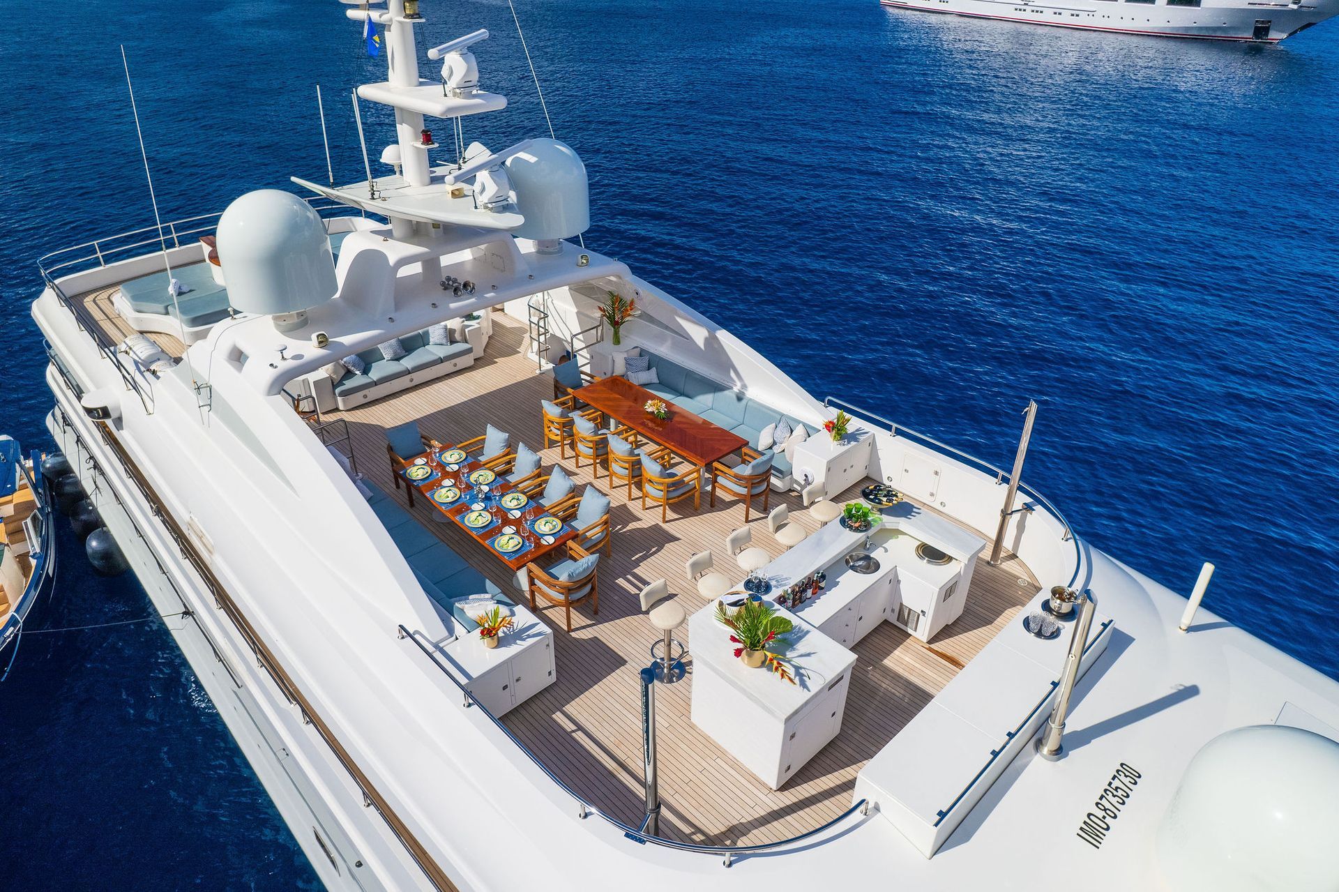 an aerial view of a large yacht in the ocean