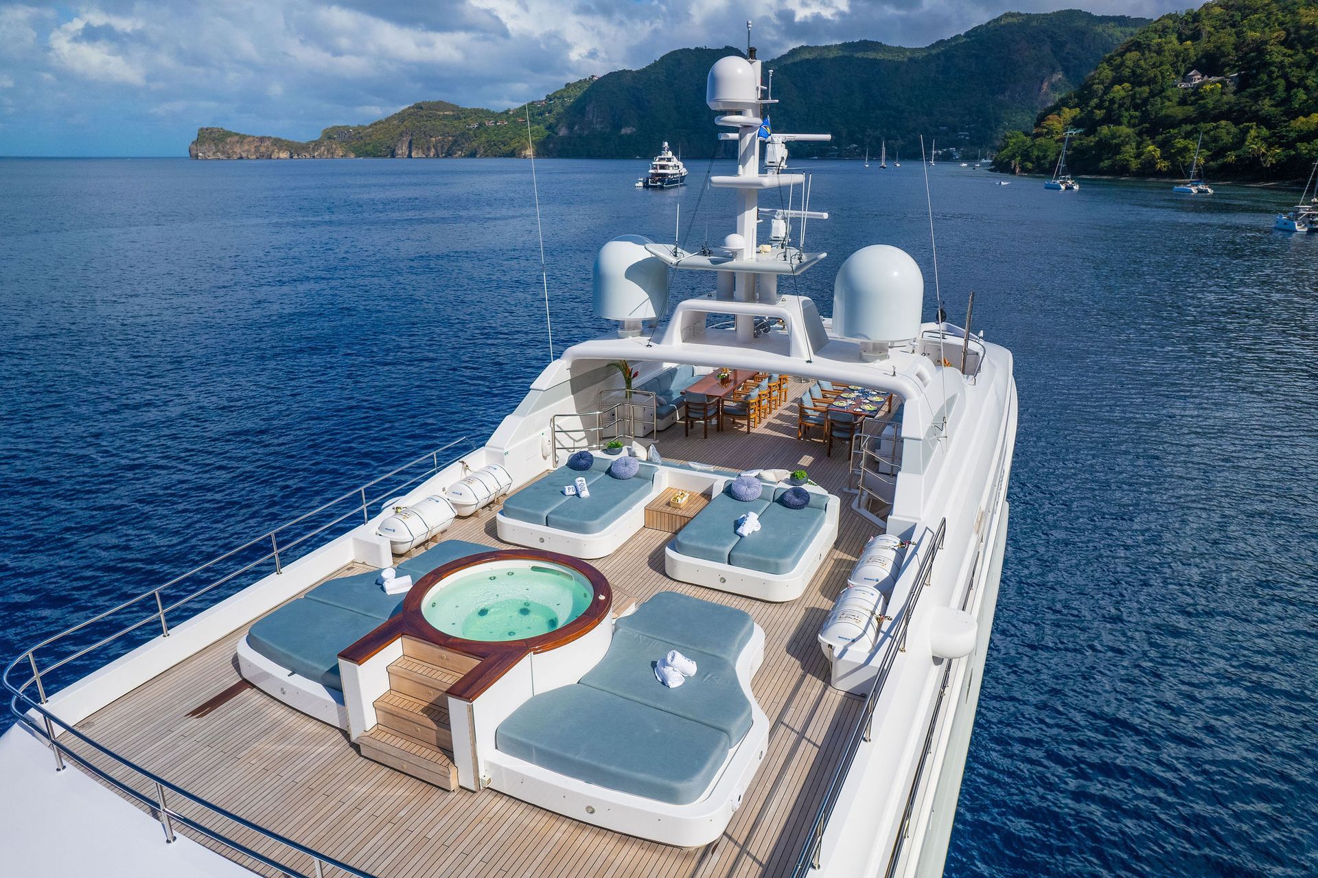 a large yacht is floating on top of a body of water