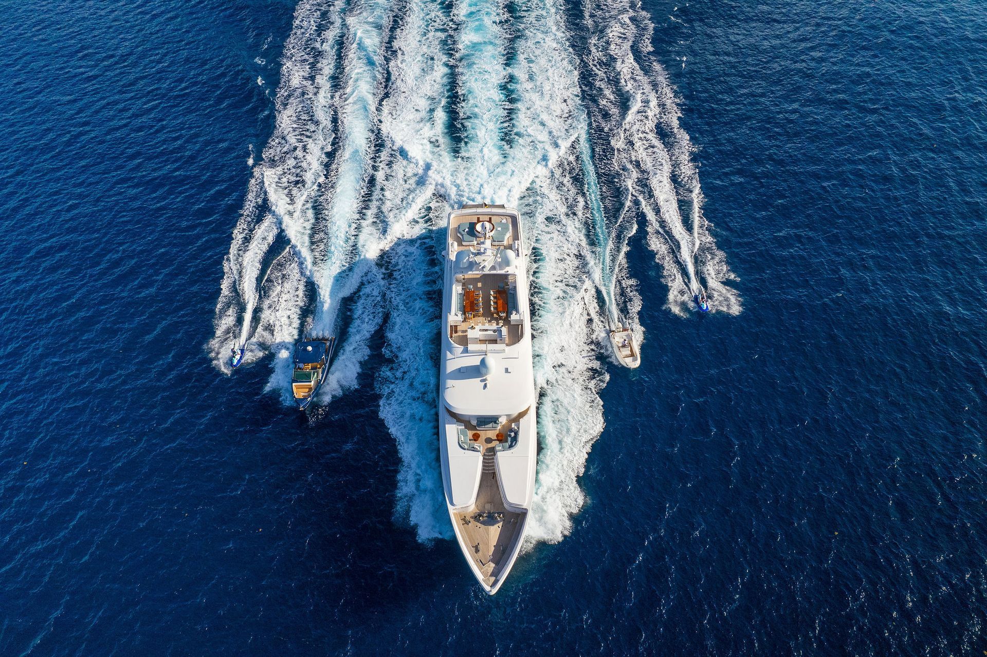 an aerial view of a large yacht floating on top of a large body of water